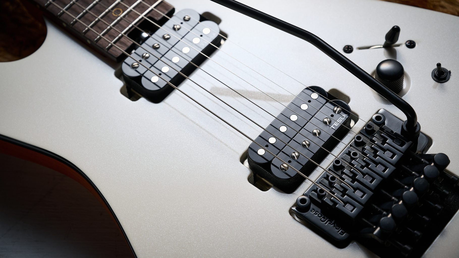 Close up of the body of the Harley Benton Fusion IV HH with Floyd Rose tremolo and Tesla humbucker pickups