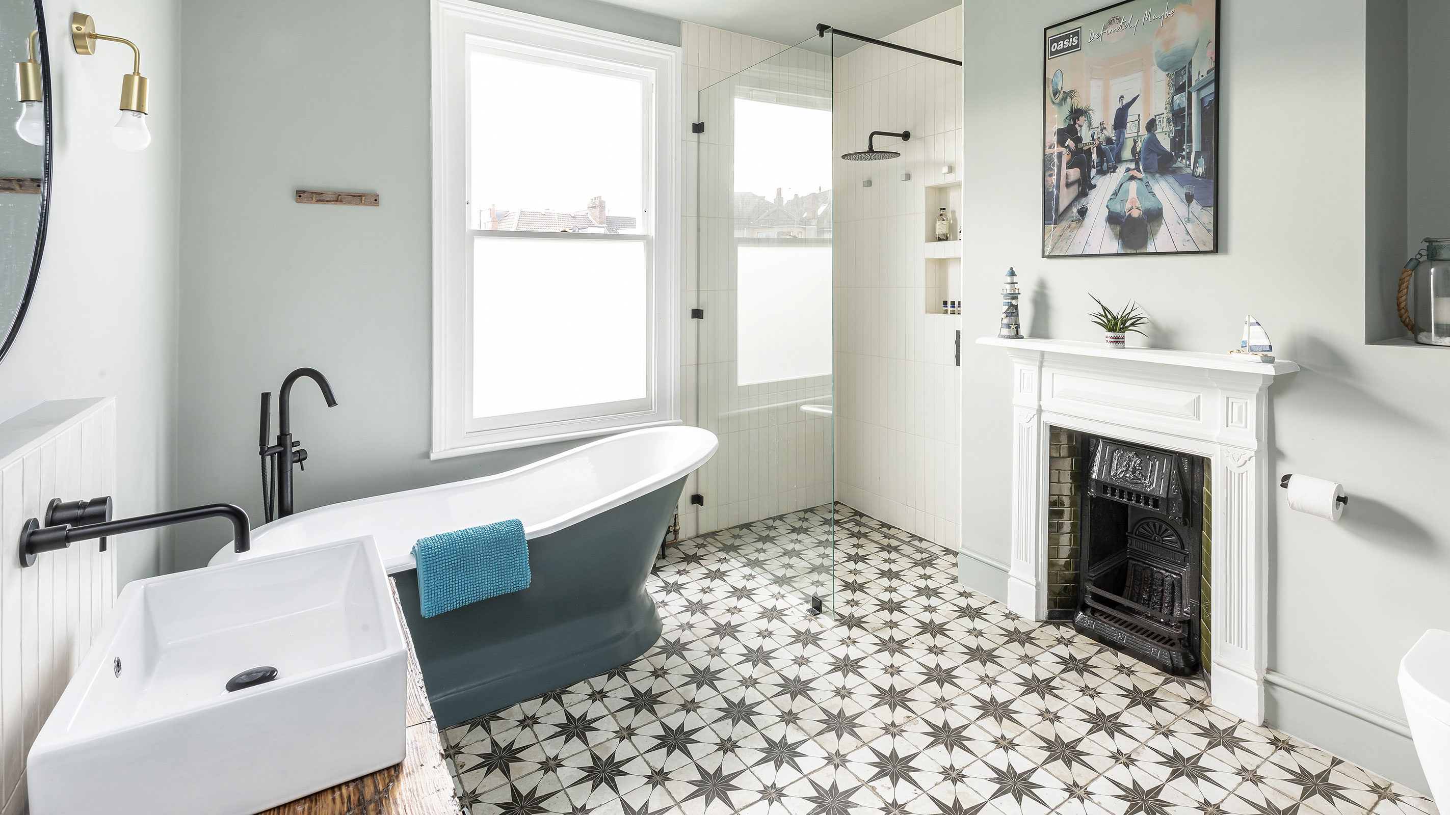 traditional bathroom with restored fireplace