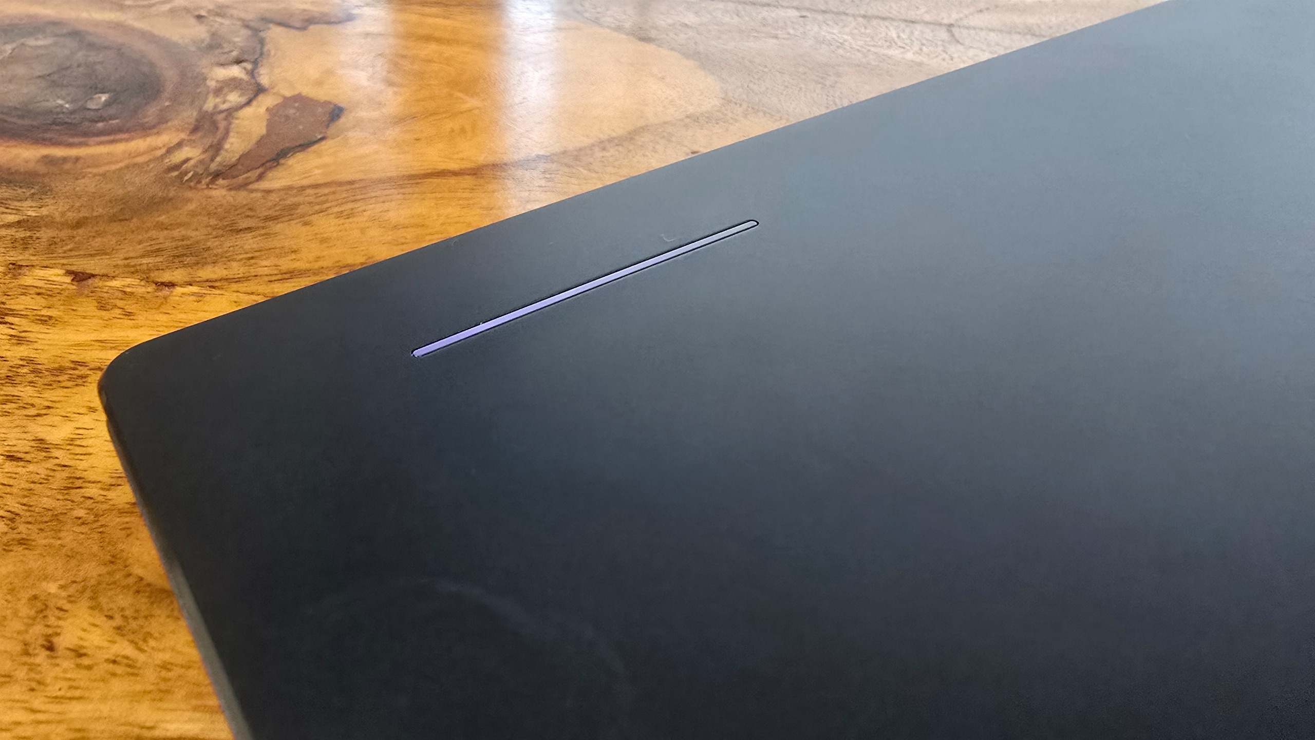 Acer Googlebook 14 on a wooden desk in an office