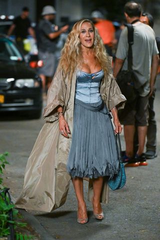 Carrie Bradshaw wearing blue corset and skirt