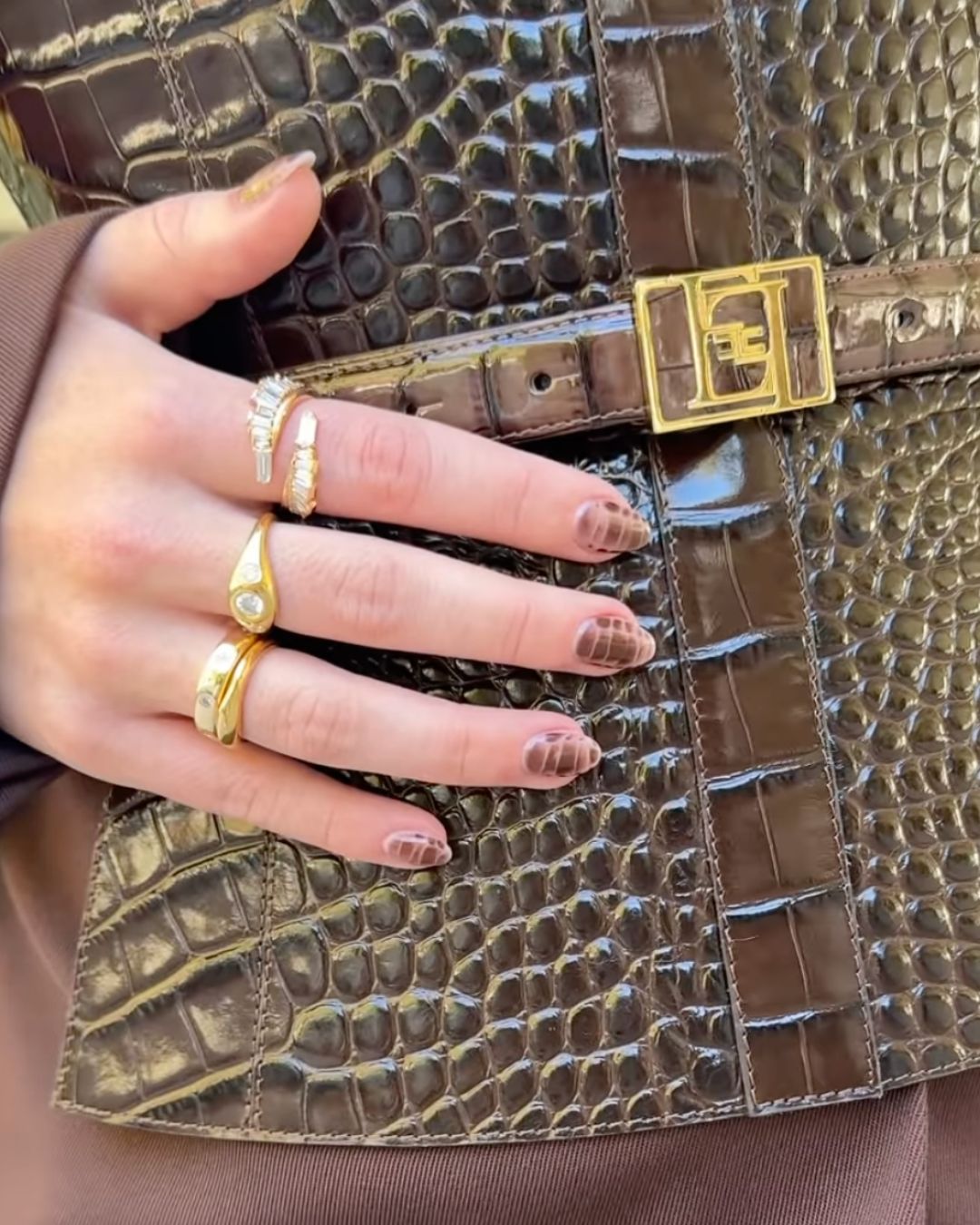A video screenshot of nail artist Zola Ganzorigt posted it on her Instagram of Brown Croc-Print Manicure in Sweeney, Sydney.