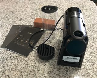Nespresso Essenza Mini coffee maker with packaging removed