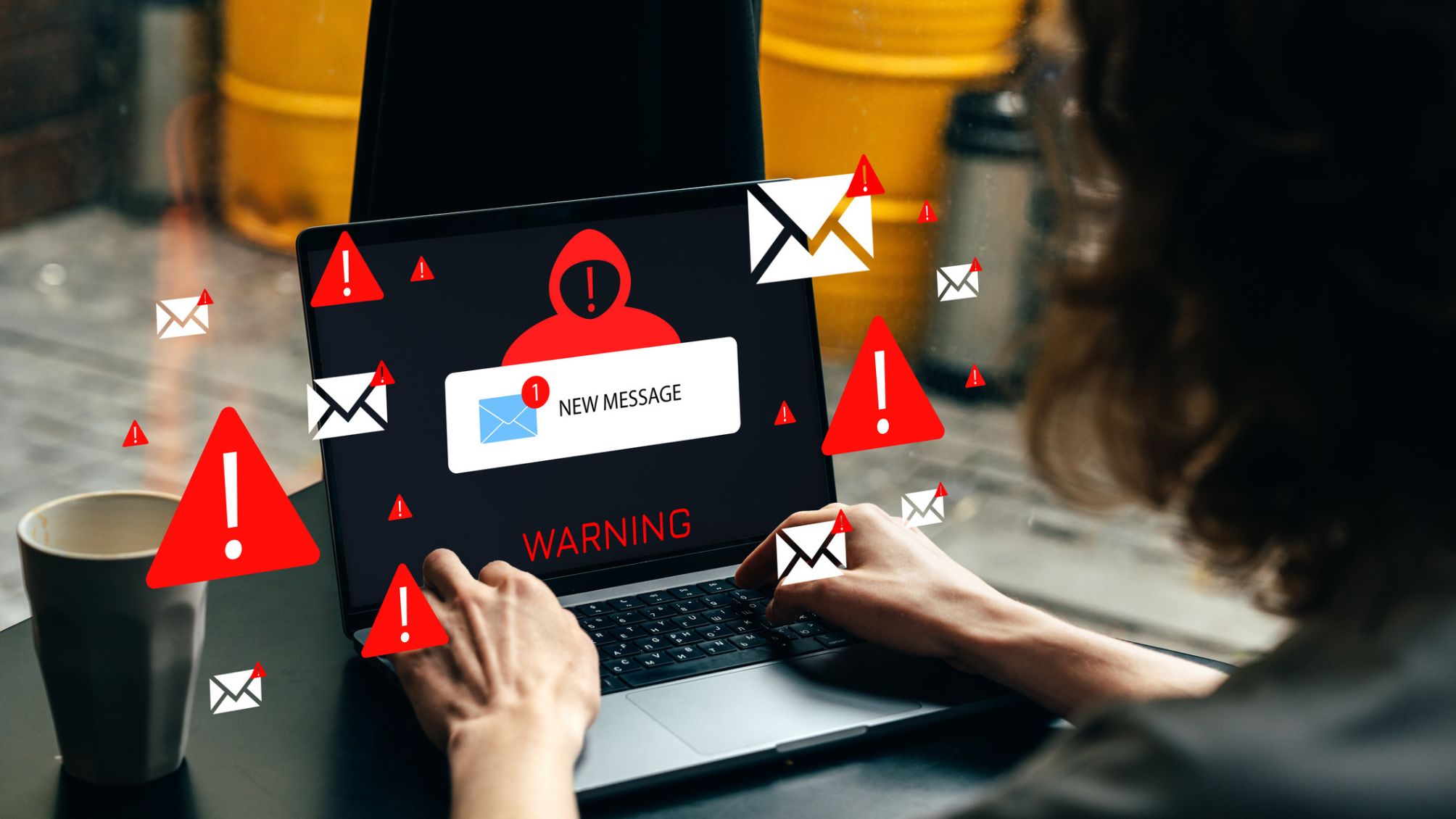 A person receiving a scam alert while using their computer.
