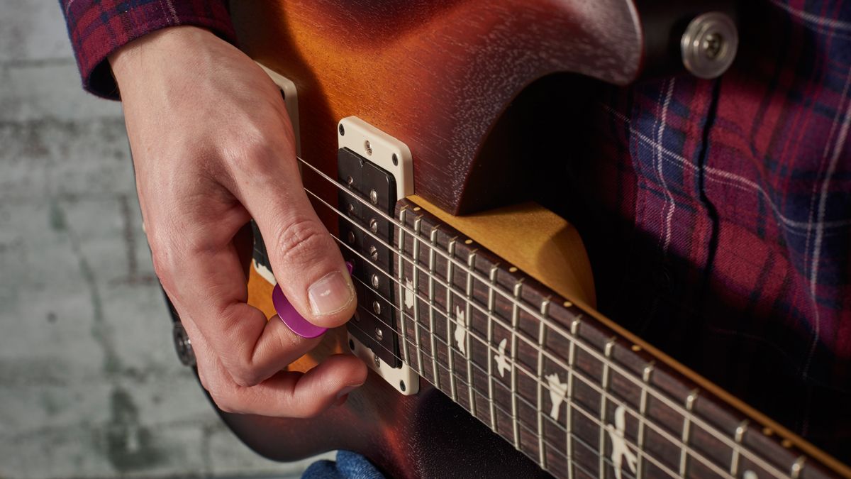 How to play a pinch harmonic on guitar