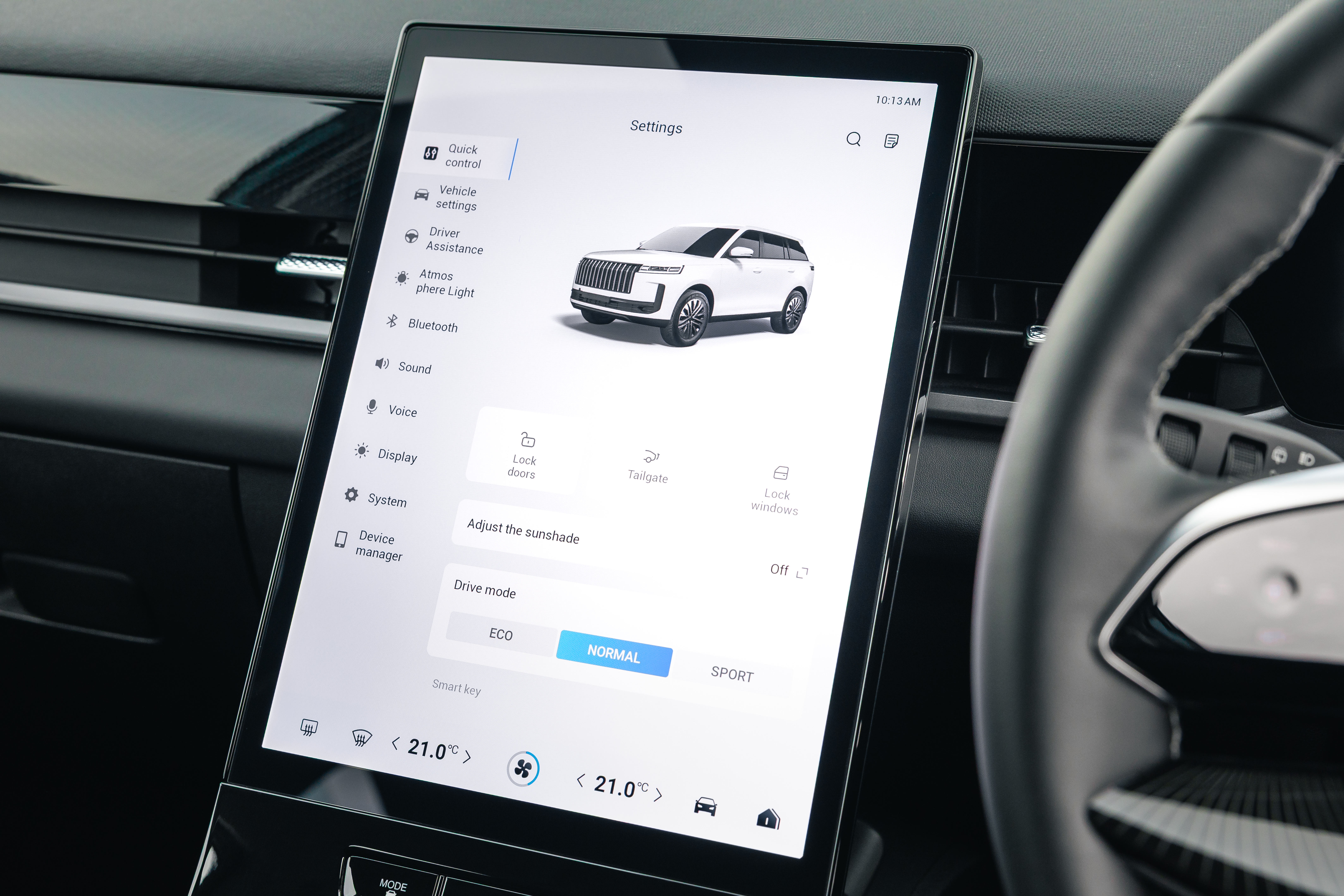 Interior shots of the Jaecoo 5, showing the boot, seats, screen and driving position