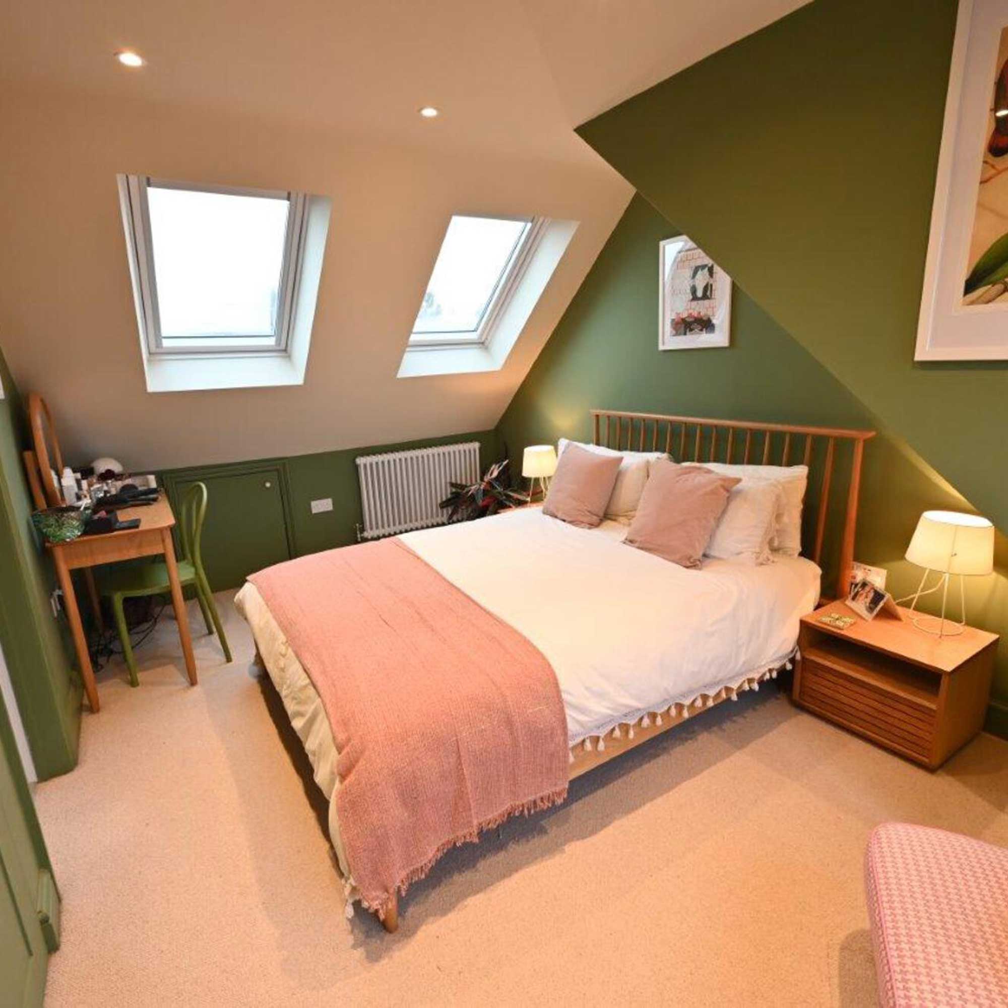 green bedroom in loft conversion