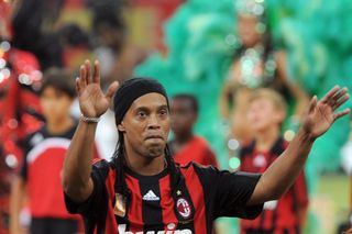 Ronaldinho salutes the fans during his presentation as an AC Milan player in July 2008.