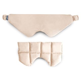 A cream colored weighted sleep mask