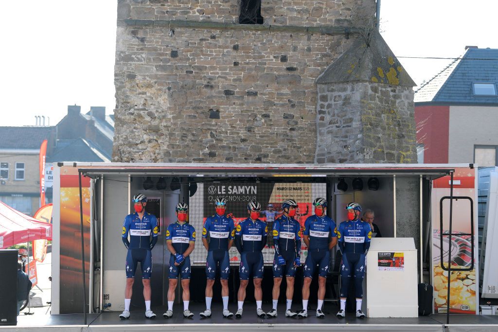 DOUR BELGIUM MARCH 02 Start Mark Cavendish of The United Kingdom Tim Declercq of Belgium Alvaro Jose Hodeg Chagui of Colombia Florian Senechal of France Stijn Steels of Belgium Jannik Steimle of Germany Bert Van Lerberghe of Belgium and Team Deceuninck QuickStep during the 53rd Grand Prix Le Samyn 2021 Mens Elite a 2054km race from Quaregnon to Dour Mask Covid safety measures Team Presentation Landscape GPSamyn on March 02 2021 in Dour Belgium Photo by Luc ClaessenGetty Images