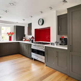 white kitchen with grey cupboard and cabinets