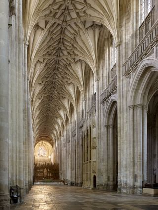 The Nave at Winchester Cathedral: The Romanesque nave as remodelled and vaulted from the late 14th century. Bishop Wykeham’s chantry is visible on the right.