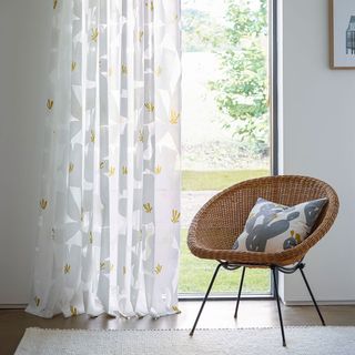 curtain pillows on chair