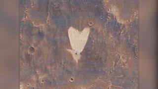 This picture of a heart-shaped feature in Arabia Terra was taken on 23 May 2010 by the CTX camera on the MRO spacecraft.