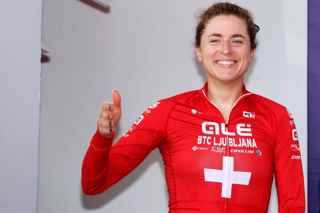 GENNEP NETHERLANDS AUGUST 26 Marlen Reusser of Switzerland and Ale Btc Ljubljana Team celebrates winning the Yellow Leader Jersey on the podium ceremony after the 23rd Simac Ladies Tour 2021 Stage 2 a 222km Individual Time Trial stage from Gennep to Gennep SLT2021 UCIWWT on August 26 2021 in Gennep Netherlands Photo by Bas CzerwinskiGetty Images