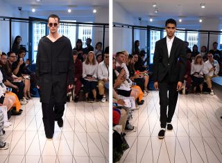 two male models at London fashion week with Chalayan clothes