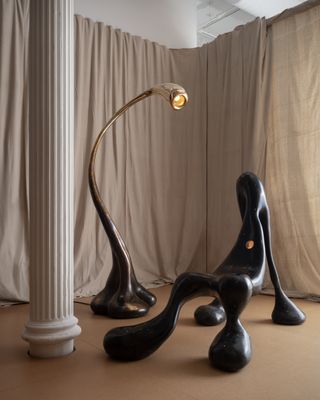 Chair and bronze lamp by Rogan Gregory