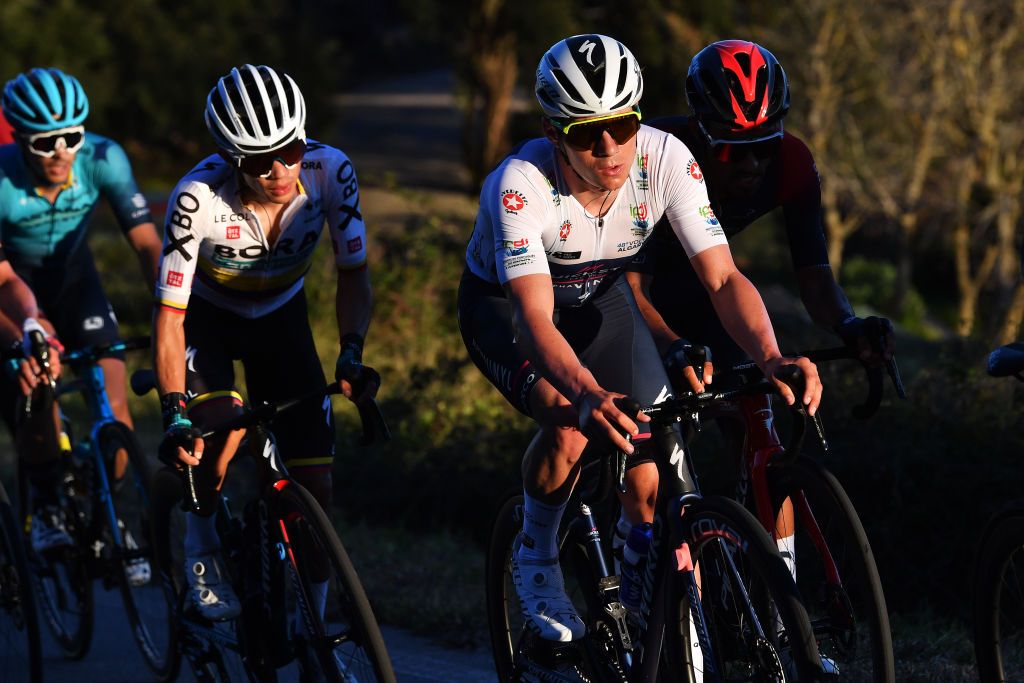 MONCHIQUE PORTUGAL FEBRUARY 17 Remco Evenepoel of Belgium and Team QuickStep Alpha Vinyl White Best Young Rider Jersey competes during the 48th Volta Ao Algarve 2022 Stage 2 a 1824km stage from Albufeira to Alto Da Foia Monchique 890m VAlgarve2022 on February 17 2022 in Monchique Portugal Photo by Luc ClaessenGetty Images