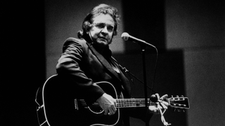 NETHERLANDS - JANUARY 01: Photo of Johnny CASH; Johnny Cash performing on stage (Photo by Michel Linssen/Redferns)