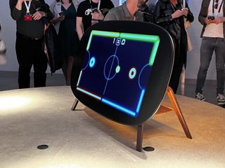 The TCL Telly Table concept, displaying a game of air hockey