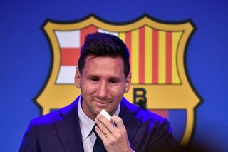 Barcelona's Argentinian forward Lionel Messi cries during a press conference at the Camp Nou stadium in Barcelona on August 8, 2021. - The six-time Ballon d'Or winner Messi had been expected to sign a new five-year deal with Barcelona on August 5 but instead, after 788 games, the club announced he is leaving at the age of 34. (Photo by Pau BARRENA / AFP) (Photo by PAU BARRENA/AFP via Getty Images)