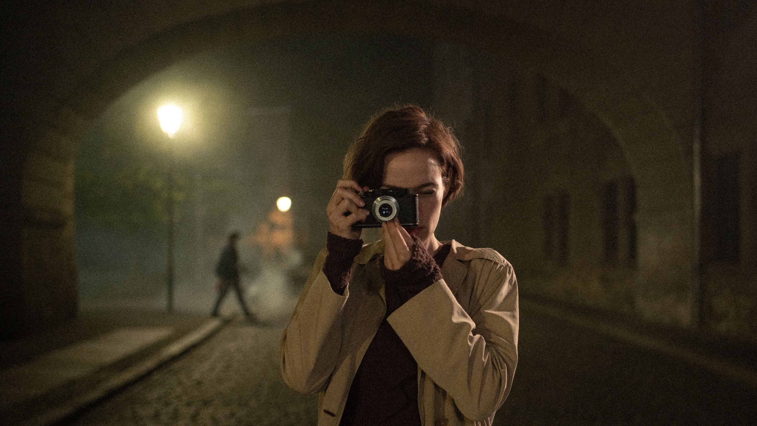 Film still from the 2026 movie The Girl with the Leica