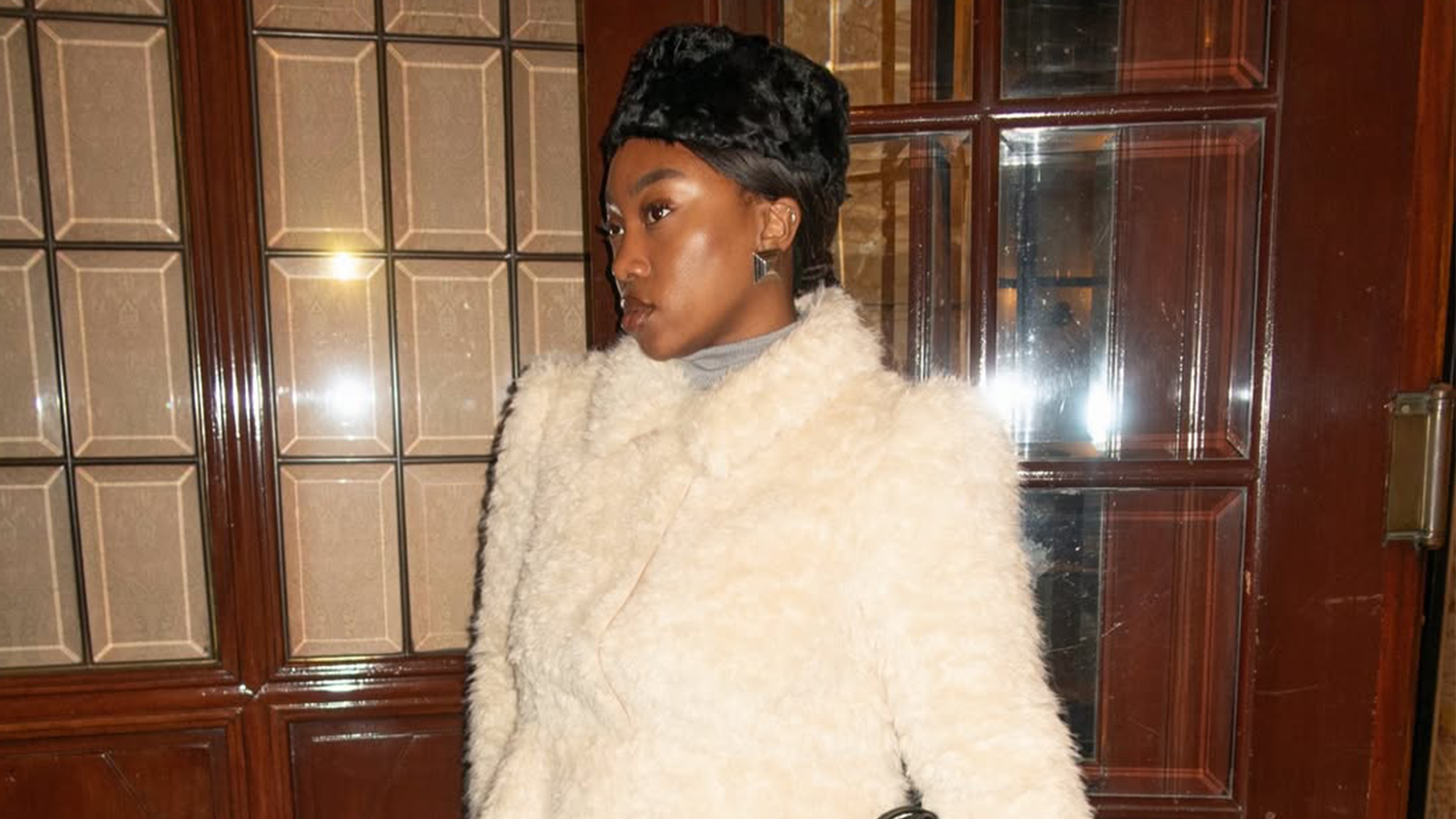 Nnenna Echem wearing a pillbox hat