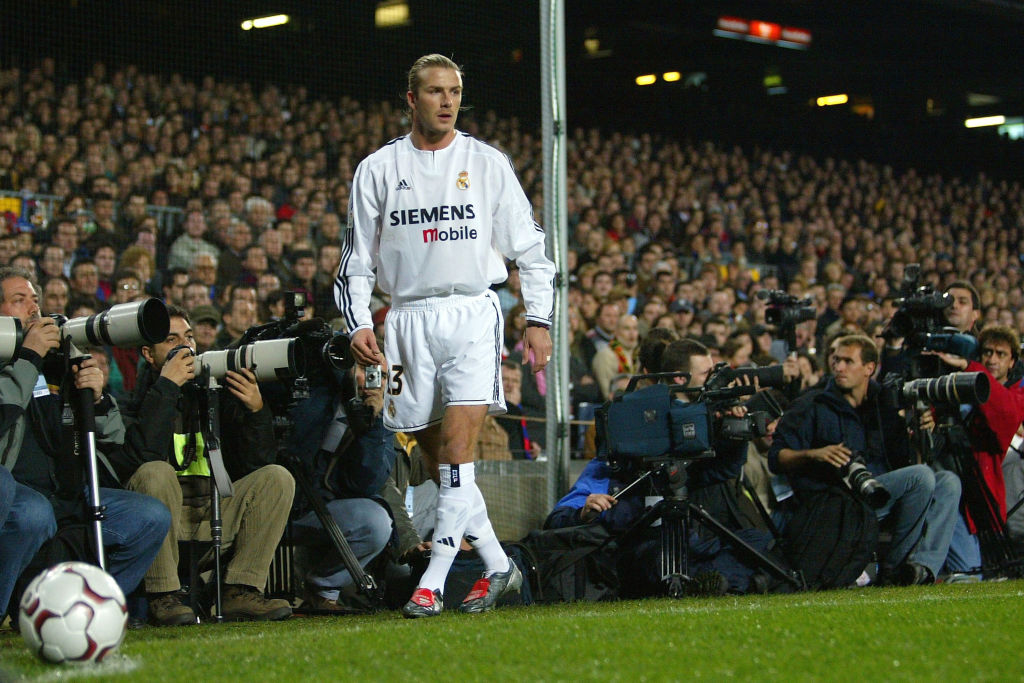 David Beckham of Real Madrid closely watched by the media during the Spanish Primera Liga match between Barcelona and Real Madrid at the Nou Camp Stadium on December 6, 2003 in Barcelona, Spain.