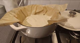 No-knead bread dough ready to bake in a Dutch oven