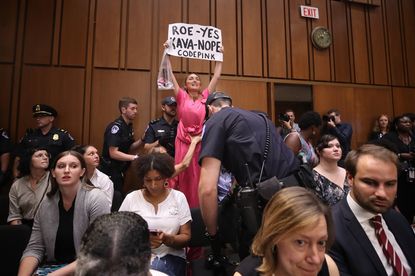 A protestor at the Brett Kavanaugh hearing.