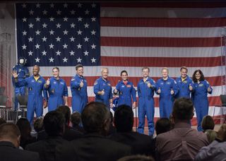 NASA has unveiled the first astronaut crews to fly on private spaceships built by SpaceX and Boeing. The astronauts are: (from left to right) Victor Glover, Mike Hopkins, Bob Behnken, Doug Hurley, Nicole Aunapu Mann, Chris Ferguson of Boeing, Eric Boe, Jo