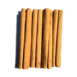 a collection of Ceylon Cinnamon Sticks on a white background