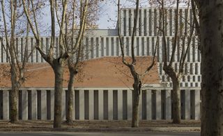 The museum’s outdoor joinery and white wooden shutters echo the Royal Palace’s exterior fixtures