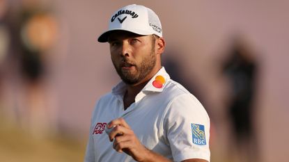 Sam Burns acknowledges the fans at The Open