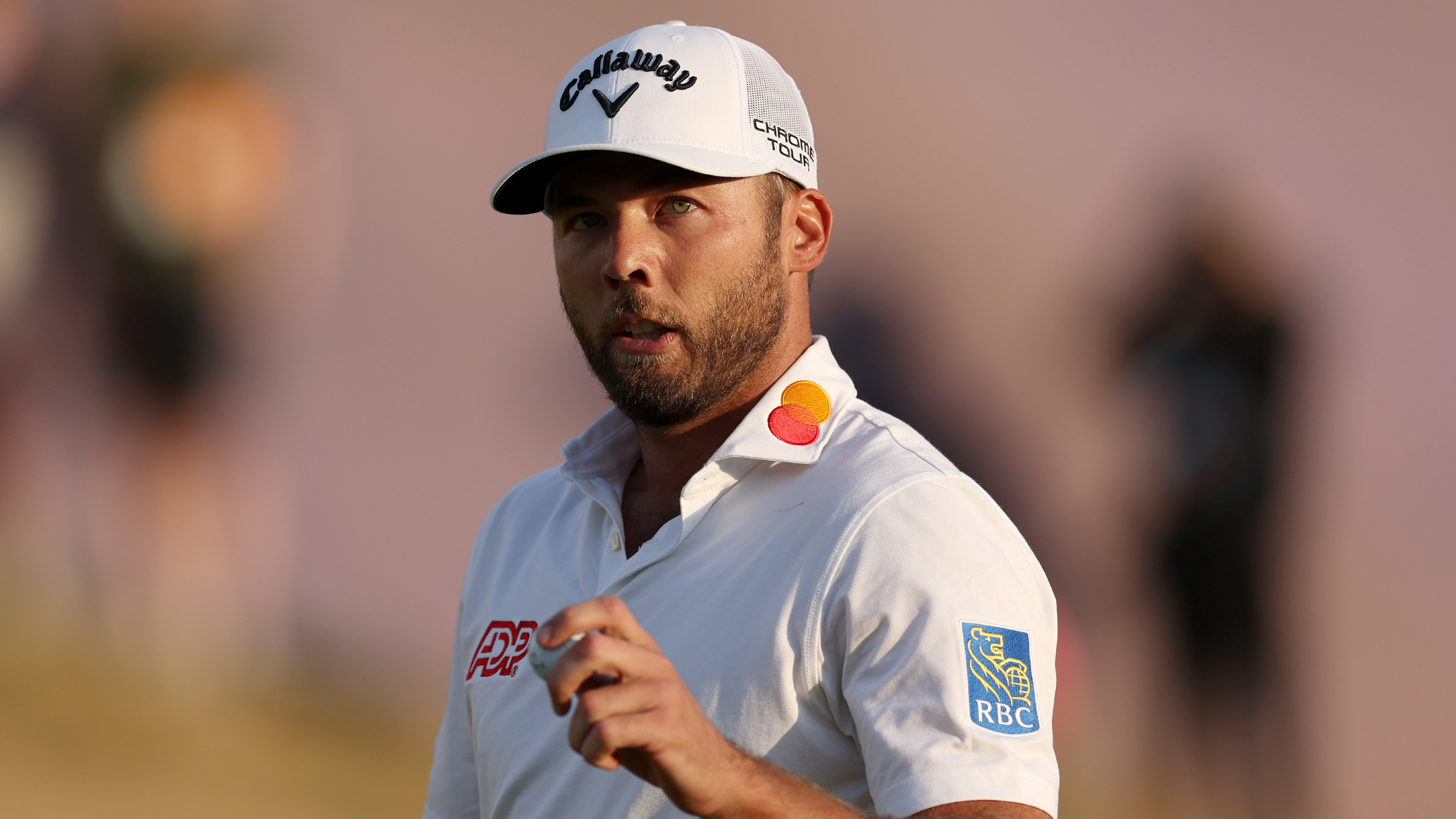 Sam Burns acknowledges the fans at The Open 