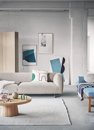 pale grey sofa with abstract pillow