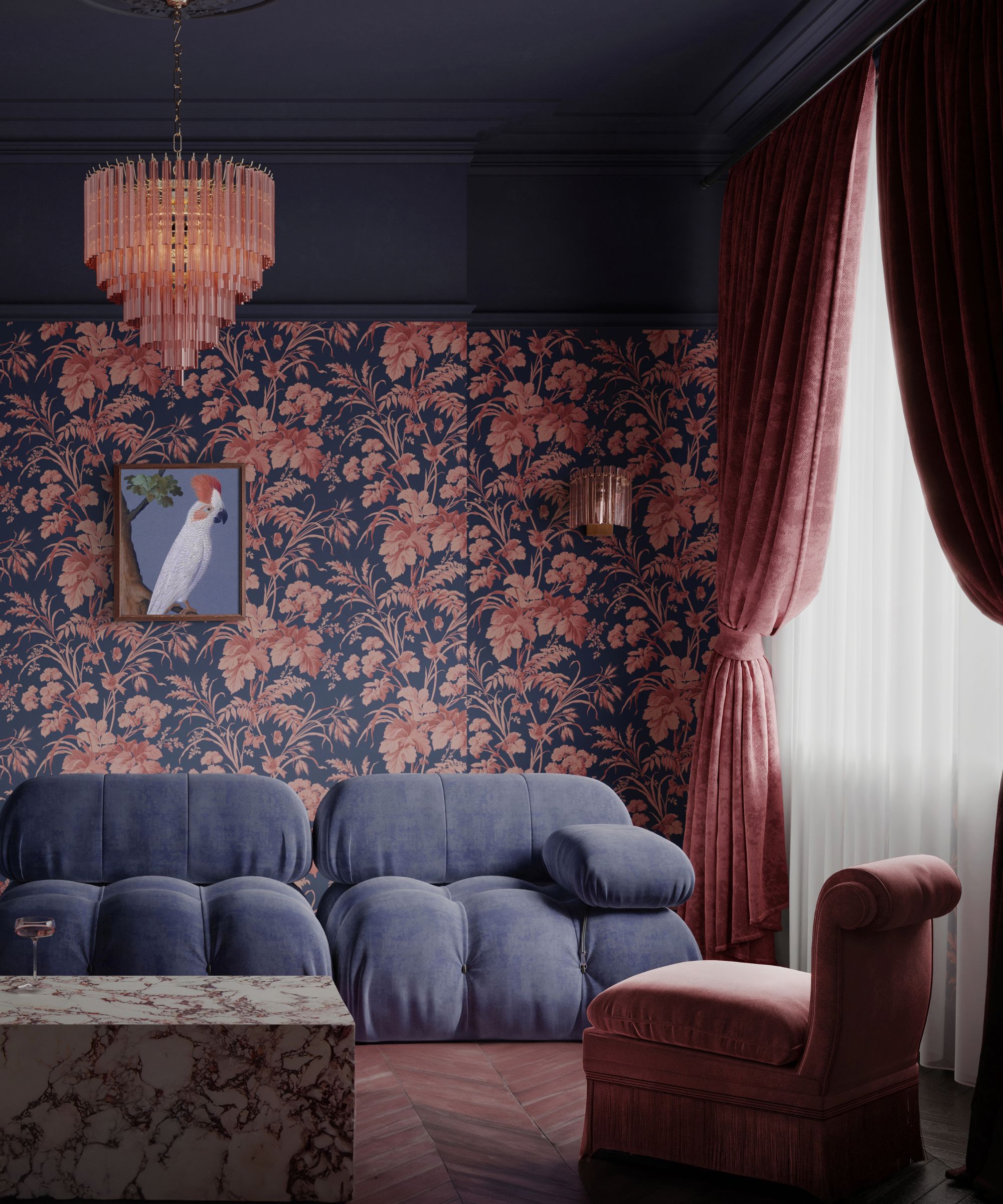 A moody sitting room with dark floral wallpaper in navy and soft pink tones. Plush velvet seating in blue and rose surrounds a marble table. Heavy curtains, warm lighting and decorative artwork create an intimate, luxurious atmosphere for evening relaxation.