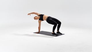 Image of woman performing table twist
