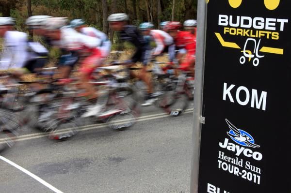 The main bunch goes past the first KOM of the day