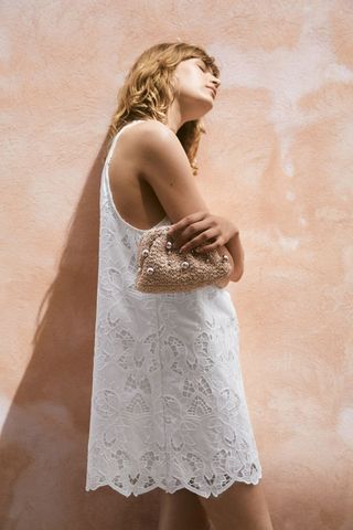 Short dress with eyelet embroidery
