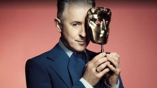 Alan Cumming posing with a BAFTA TV Award statuette in a promotional image for the 2025 BAFTA TV Awards.