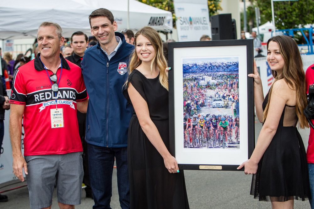 USA Cycling CEO Derek Bouchard-Hall gets presented with the Redlands Bicycle Classic Legends Award