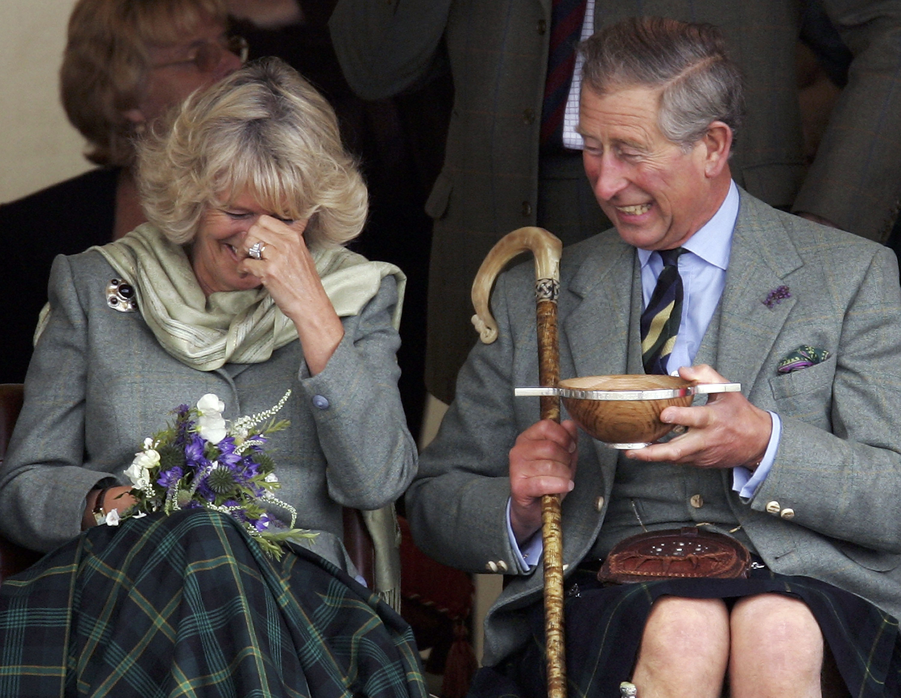 Prince Charles Duke of Rothesay and Camilla The Duchess of Rothesay enjoy a lighter moment during the tug of war at the 2005 Mey Games at Queens Park in Mey on August 6, 2005 in Caithness, Scotland.Prince Charles attends smallest games in Scotland near The Castle of Mey, the late Queen Mother's favourite holiday residence. The Duke of Rothesay takes his grandmother's place on the pavilion, having replaced her as honorary chieftain of the games. *** Local Caption *** Prince Charles Duke of Rothesay;Camilla The Duchess of Rothesay