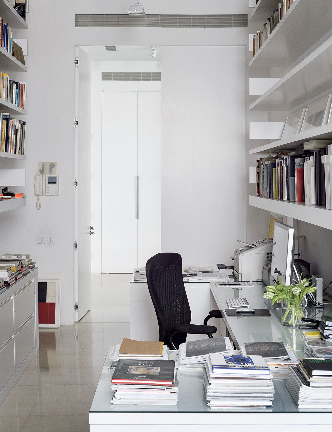 Modern home office with bookshelves
