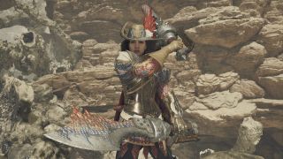 Monster Hunter Wilds - a player in armor holds two blades at the ready