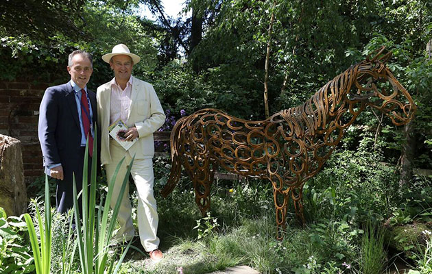 (L-R) World Horse Welfare Chief Executive Roly Owers with Hugh Bonneville on the World Horse Welfare Garden at RHS Chelsea 2017