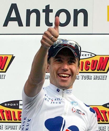 Thumbs up! Brad McGee on the podium