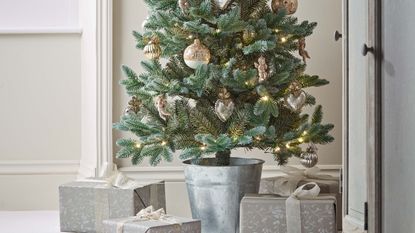 Christmas tree in a silver metal pot