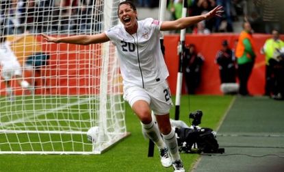 Abby Wambach celebrates after her goal Wednesday against France: The team captain is tough and fearless, and was a big part of the American team making it to the World Cup finals.