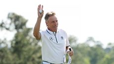 Bernhard Langer acknowledges the patrons after his final hole at The Masters 