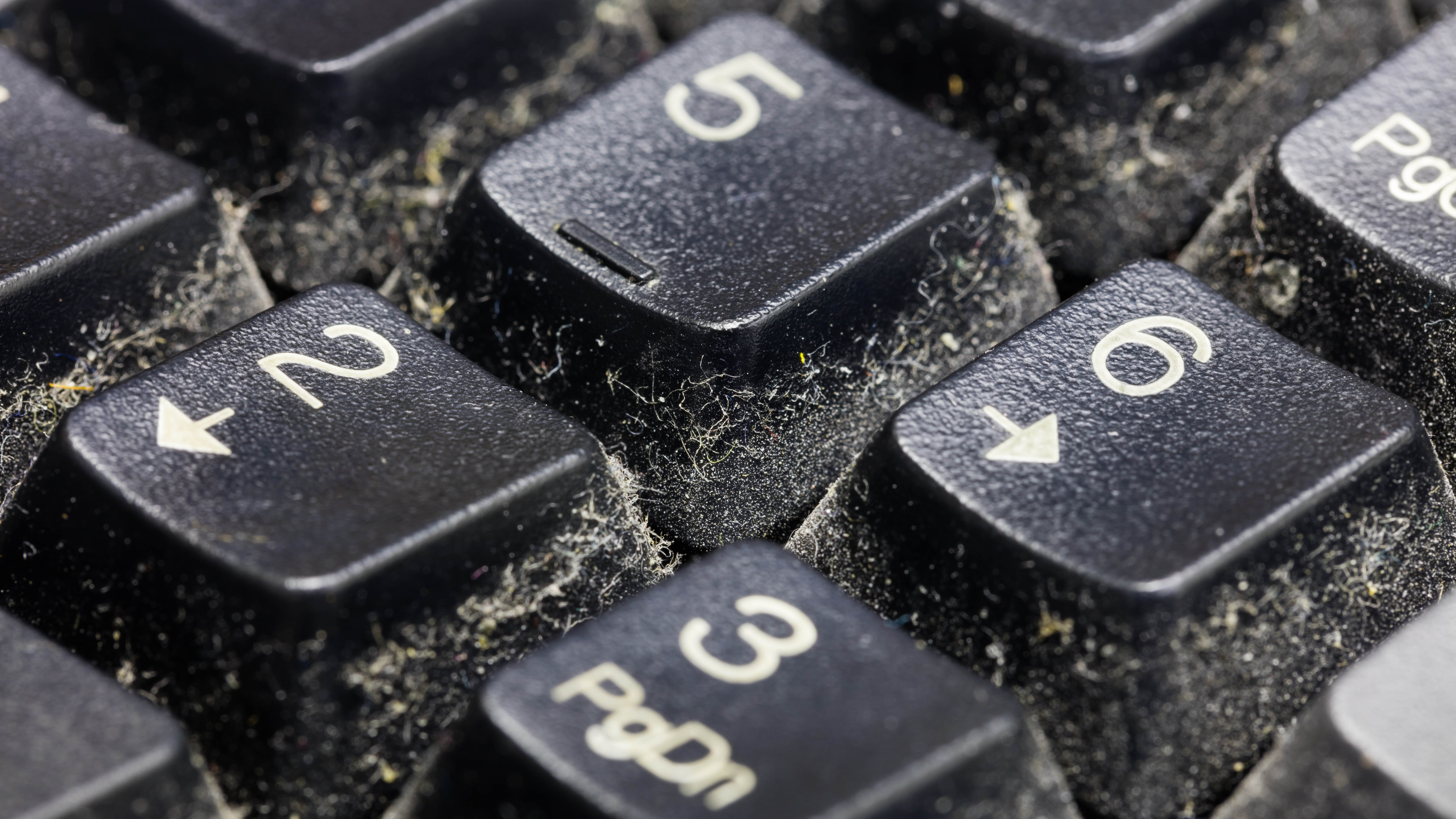 Close up of dusty keys on a keyboard
